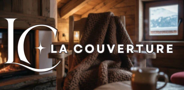 couverture marron chalet montagne cheminée neige dehors ambiance cosy
