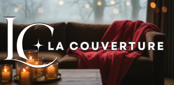 couverture rouge canapé hiver bougies lumière tamisée ambiance cosy